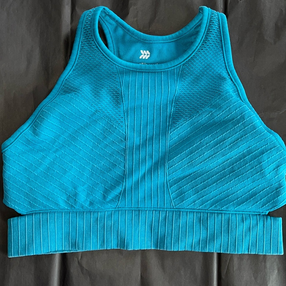 all in motion turquoise medium support longer line racer back sports bra